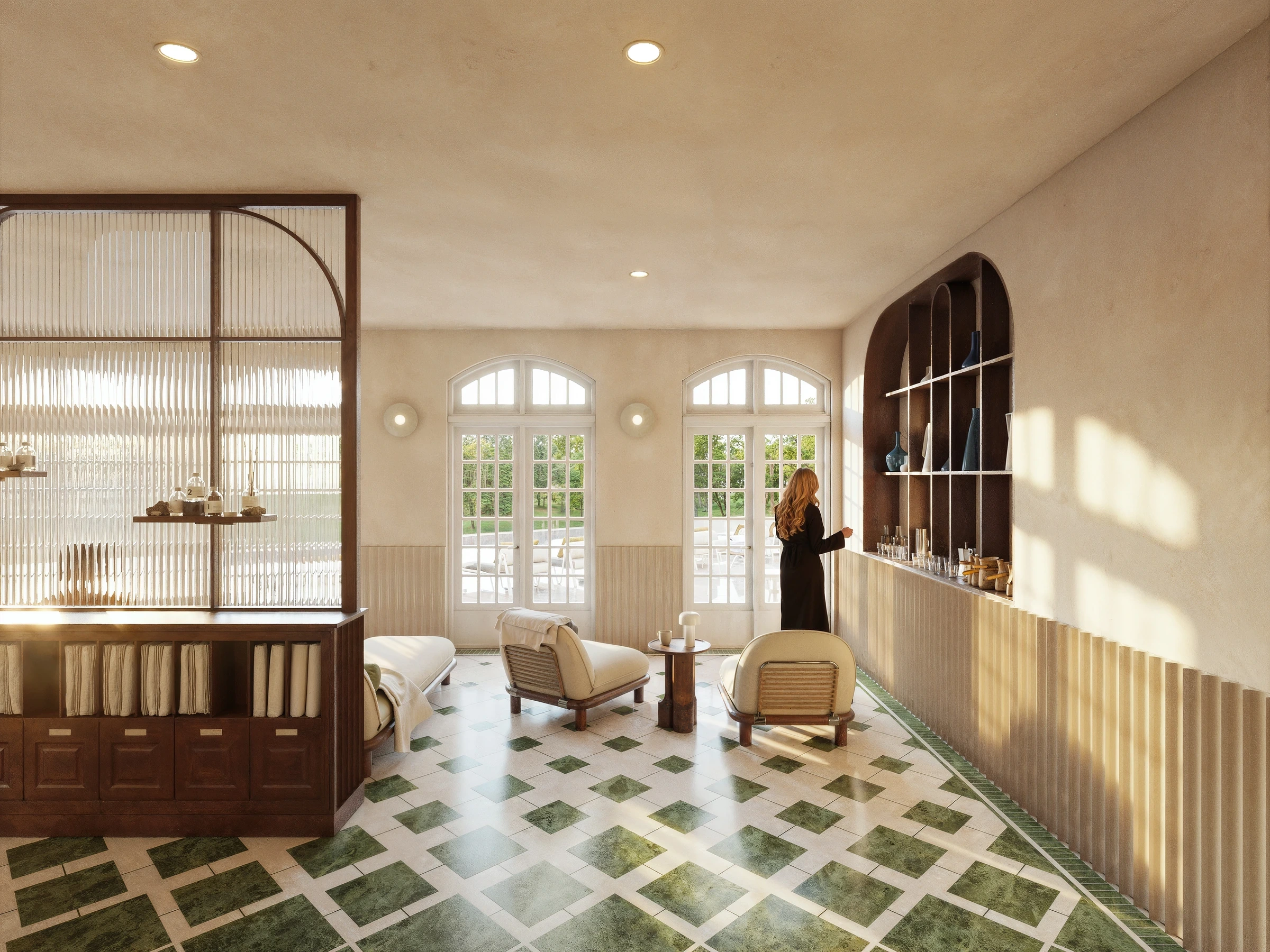 Perspective du salon et de la tisanerie du spa proposé par Plié au Château de la Tour, entre bois, carrelage vert et verre cannelé