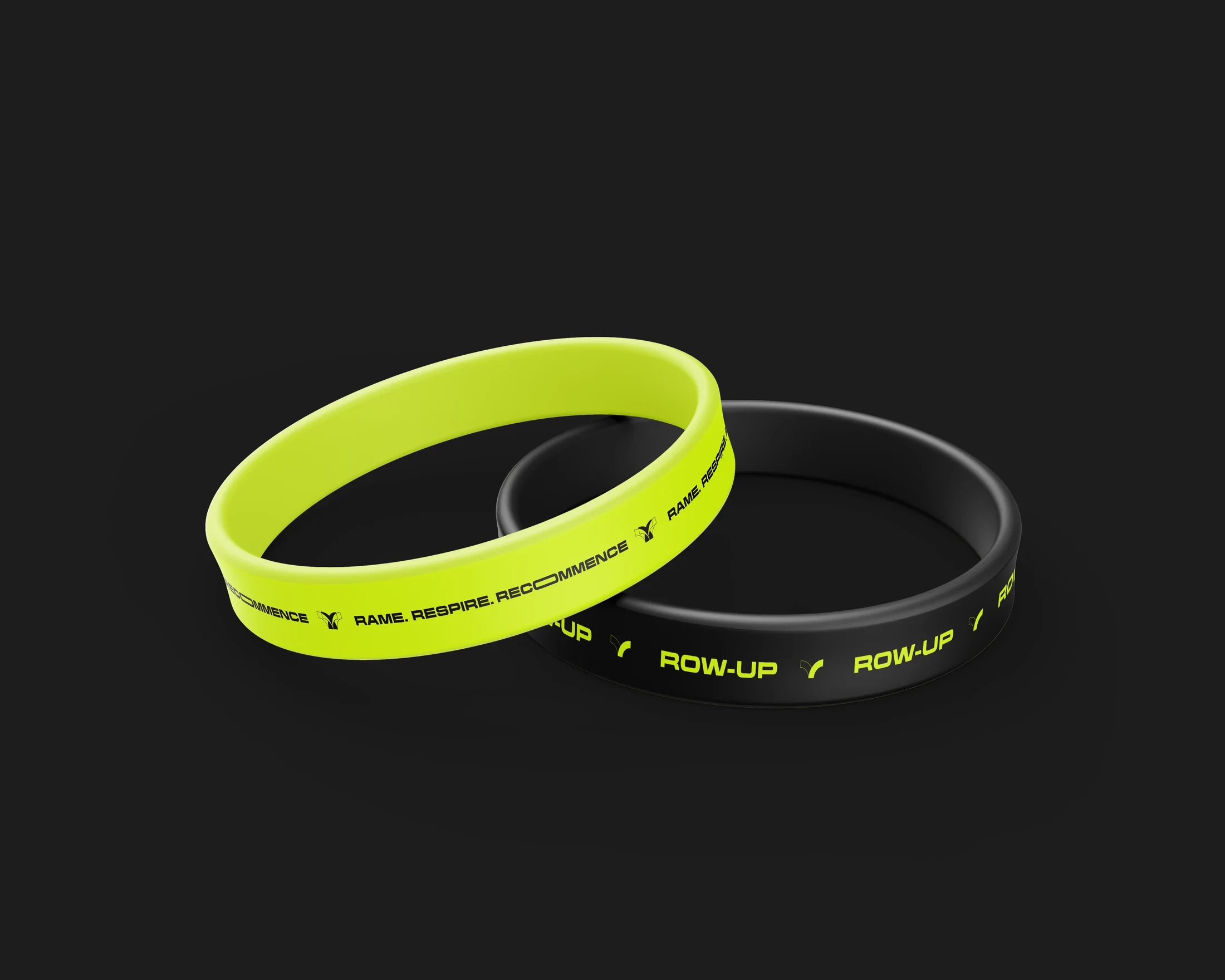 Bracelets noirs et jaune électrique déclinant le système d’identité Row Up